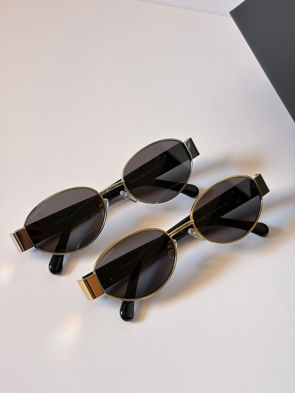 CHANEL Sunglasses: Oval