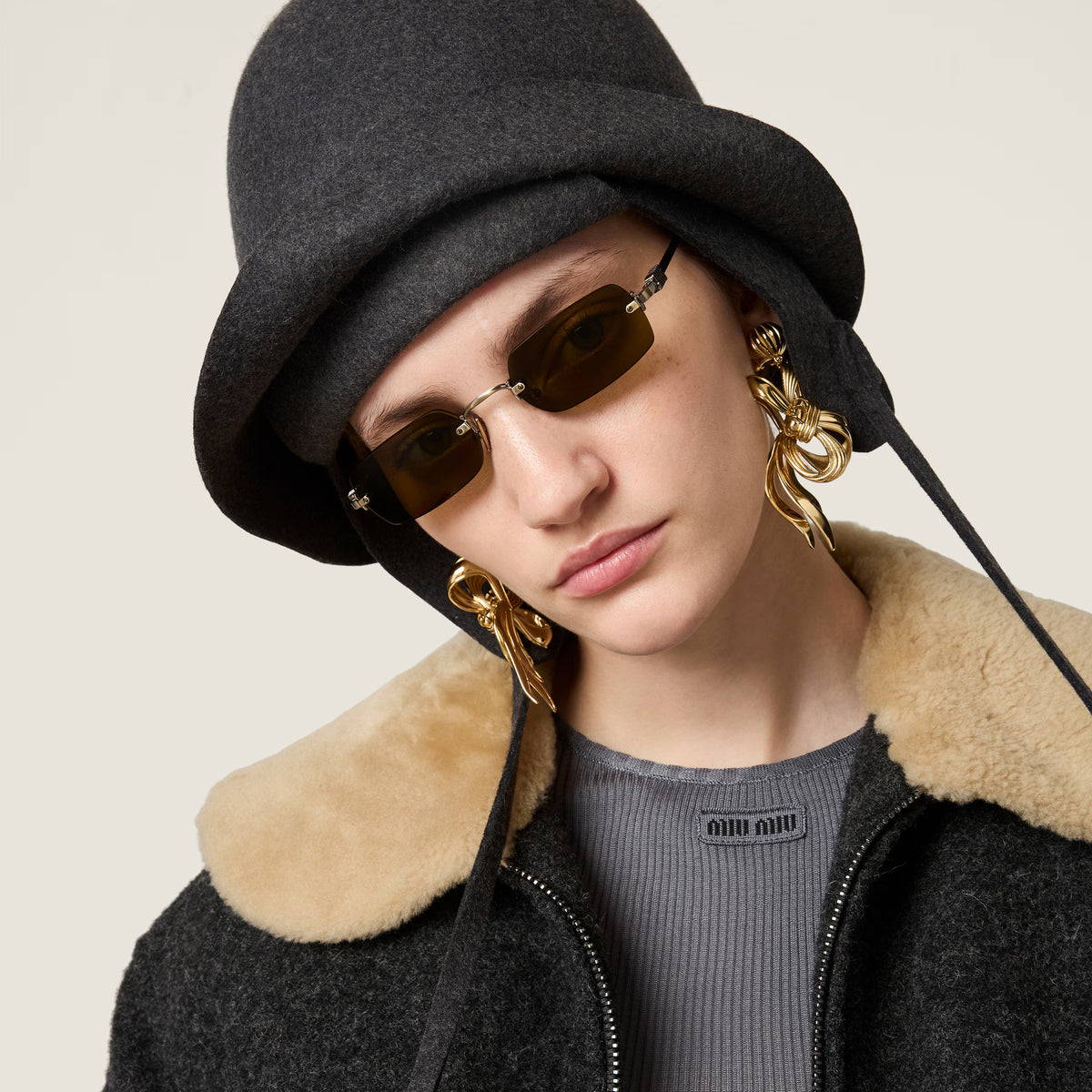 Miu Miu Vertical Logo Rimless Rectangle Sunglasses