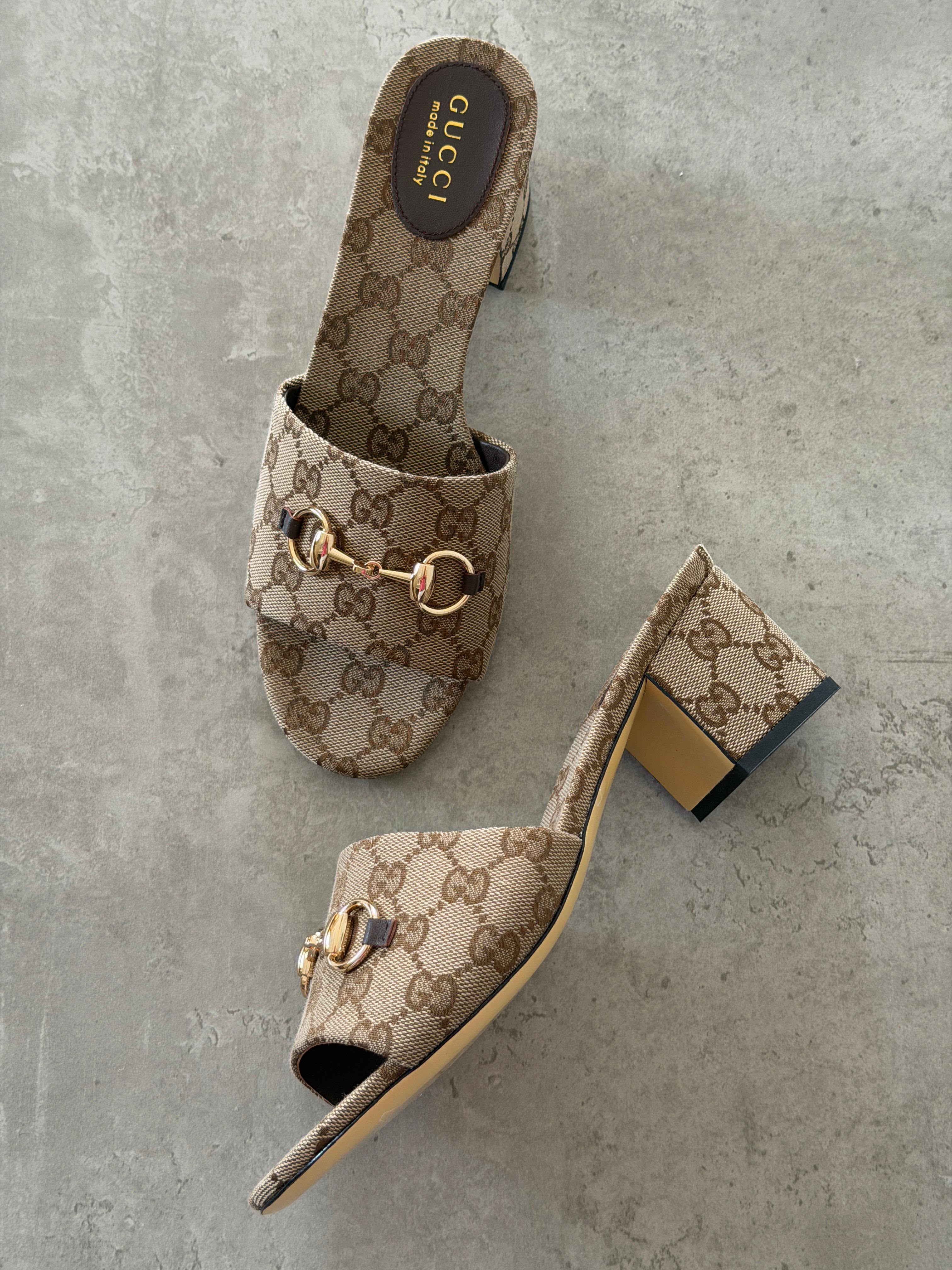 Gucci Horsebit slide sandals in GG canvas