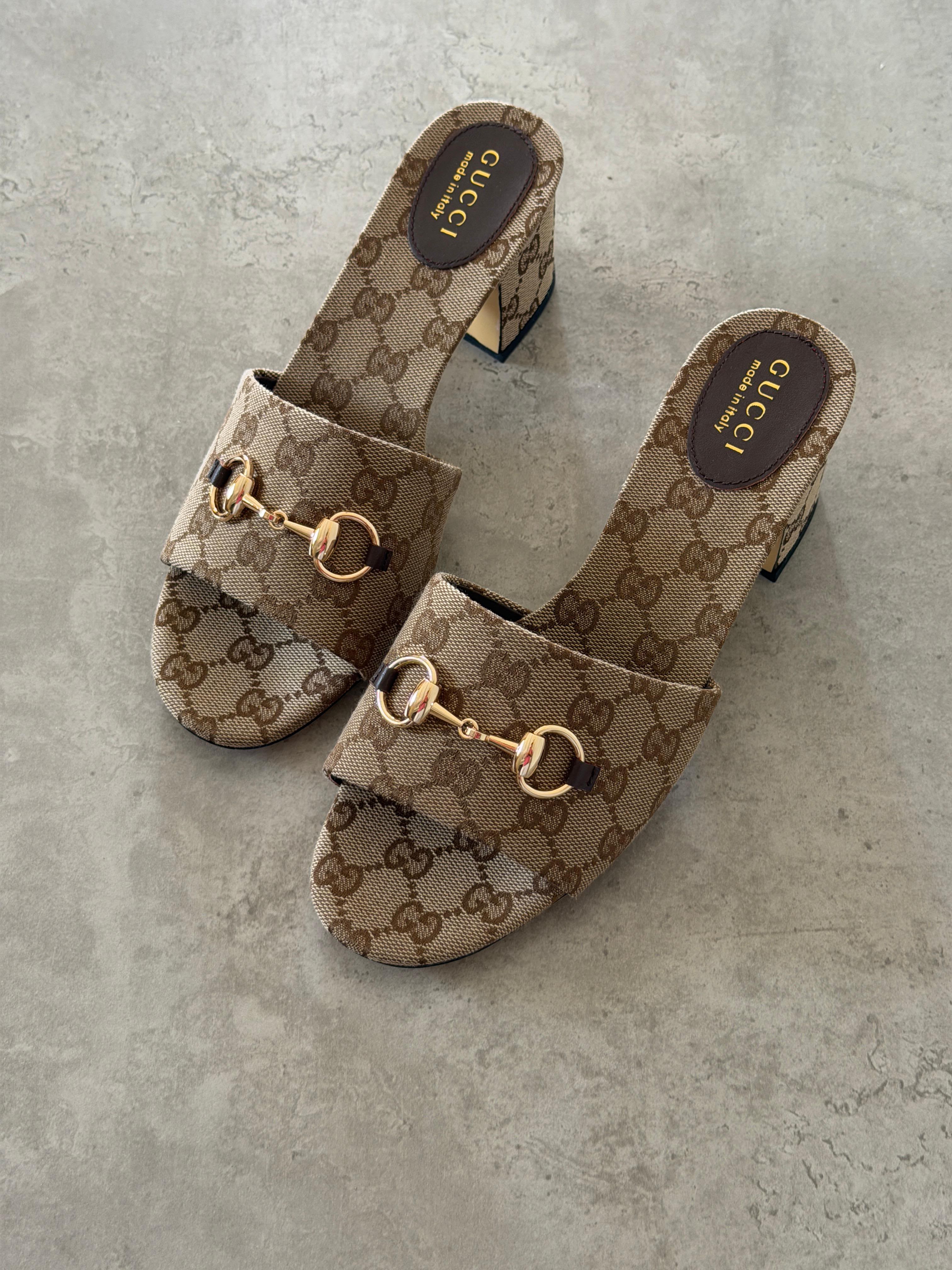 Gucci Horsebit slide sandals in GG canvas