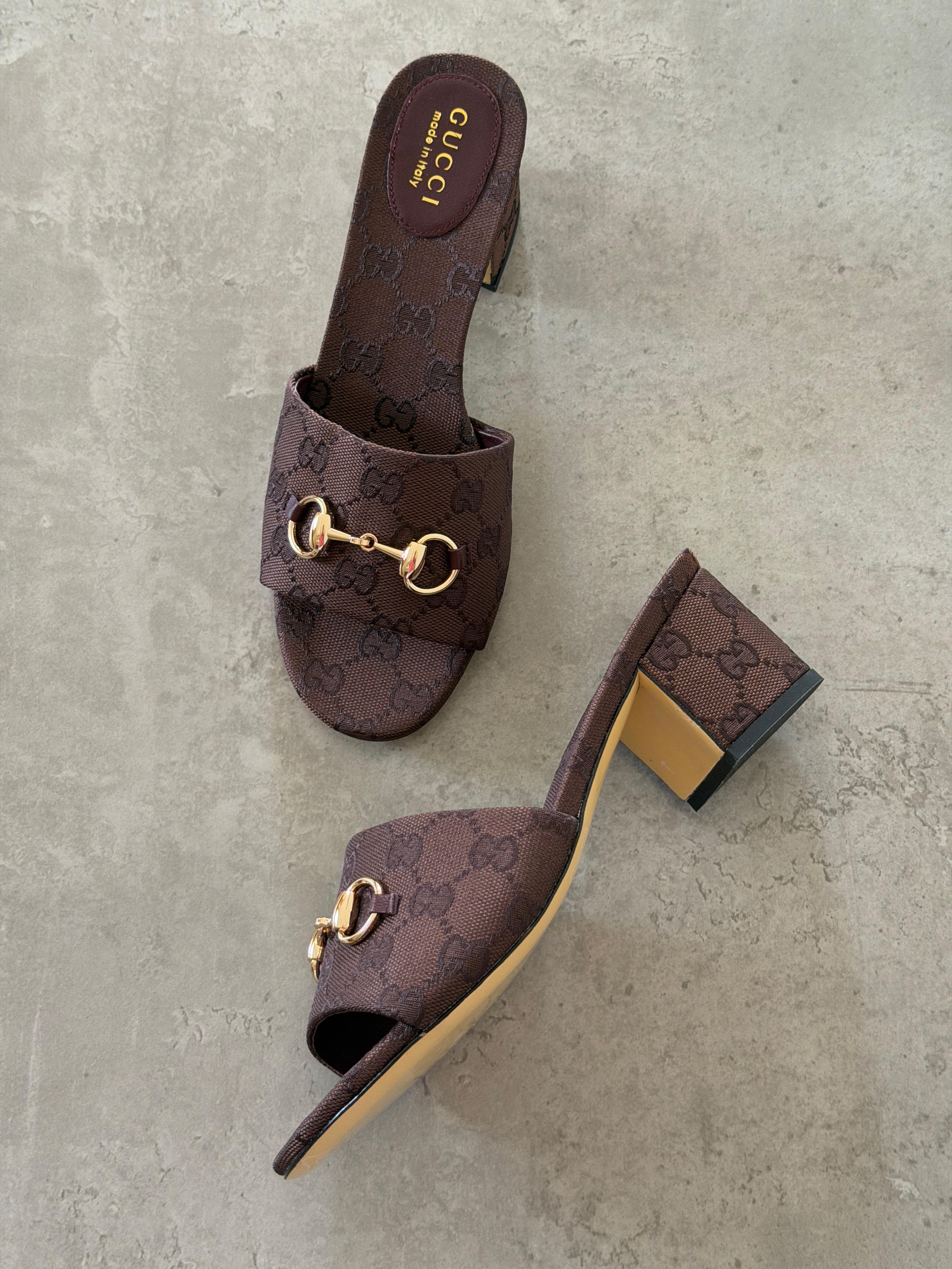Gucci Horsebit slide sandals in GG canvas