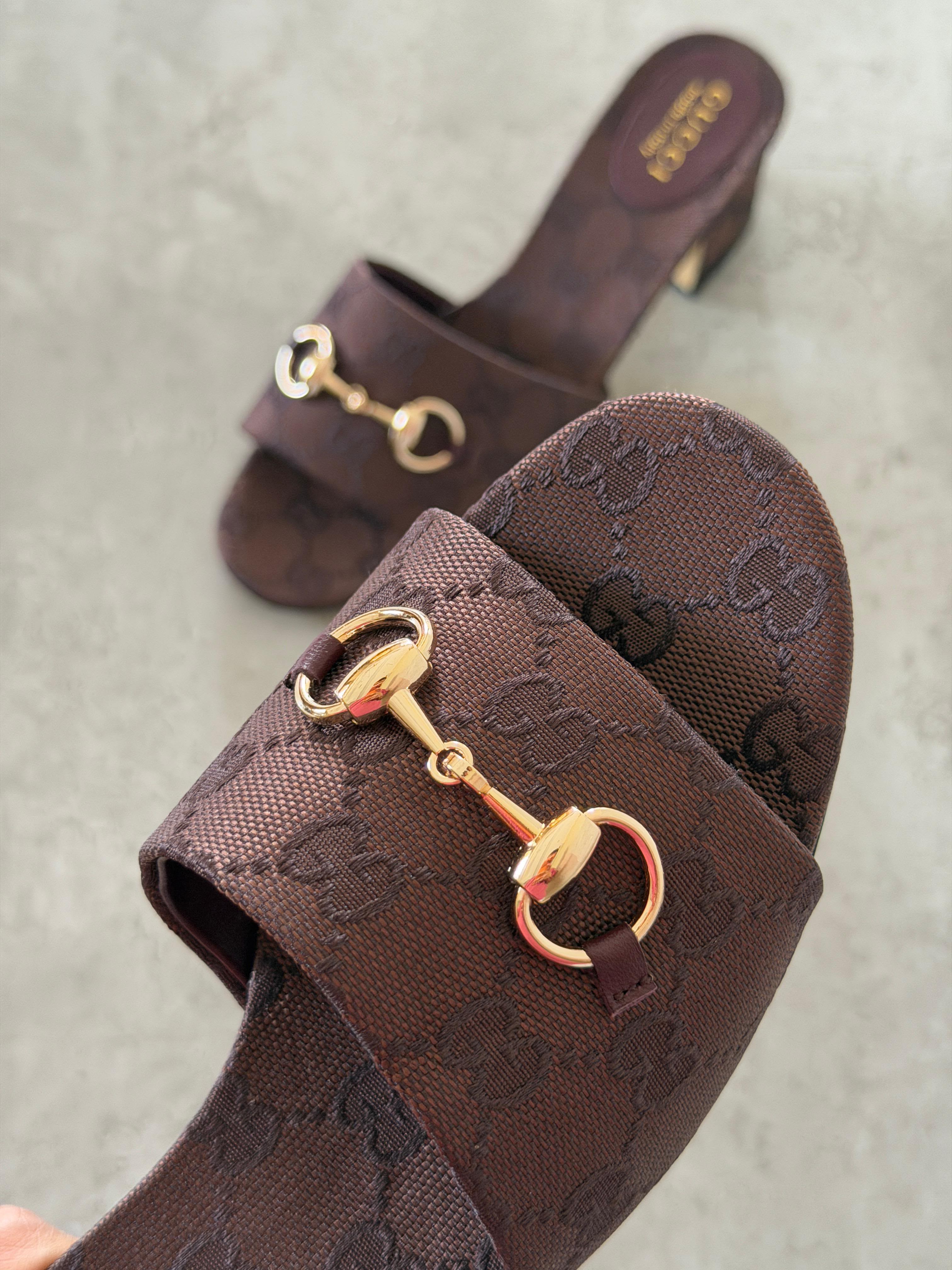 Gucci Horsebit slide sandals in GG canvas