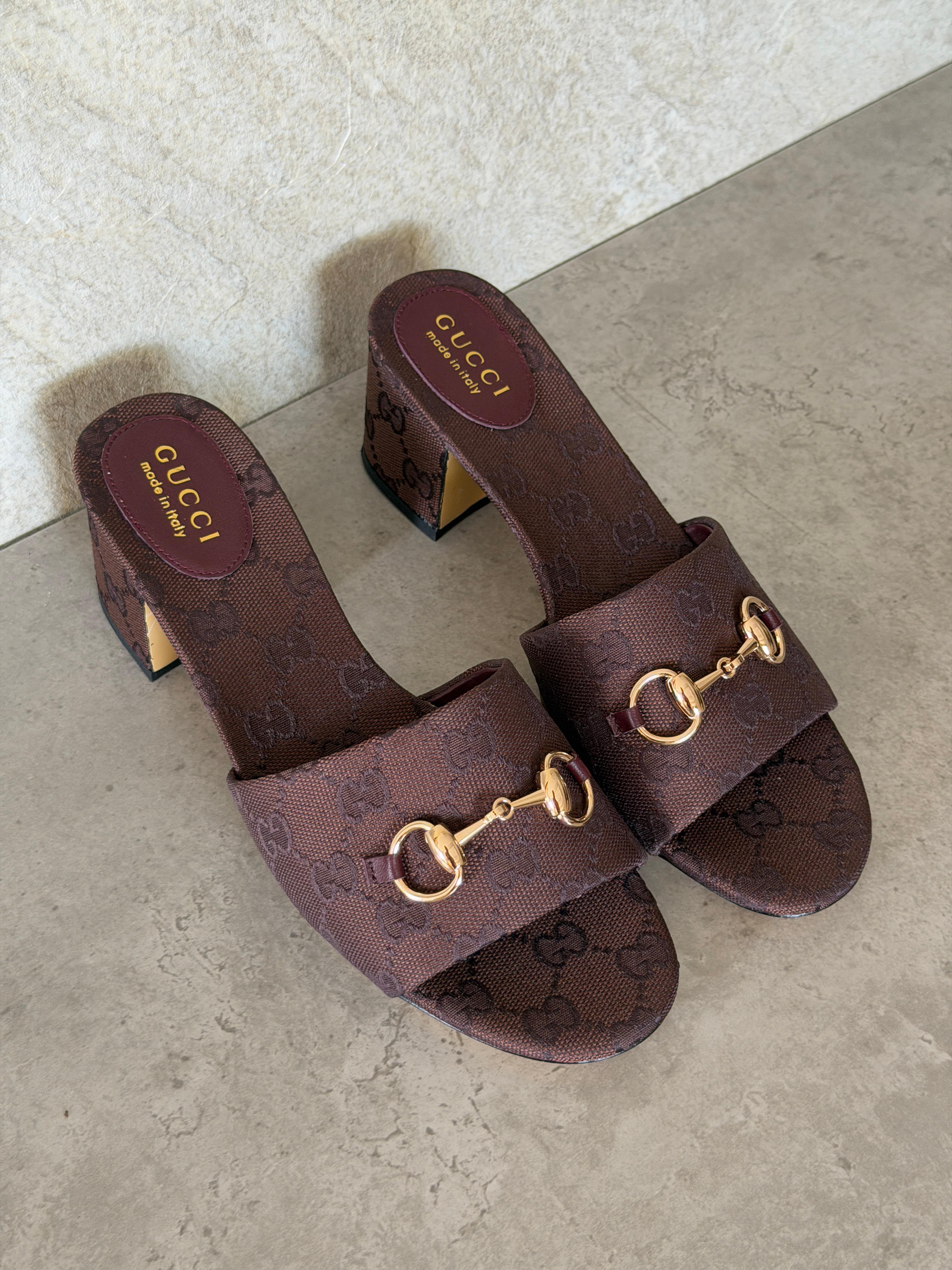 Gucci Horsebit slide sandals in GG canvas