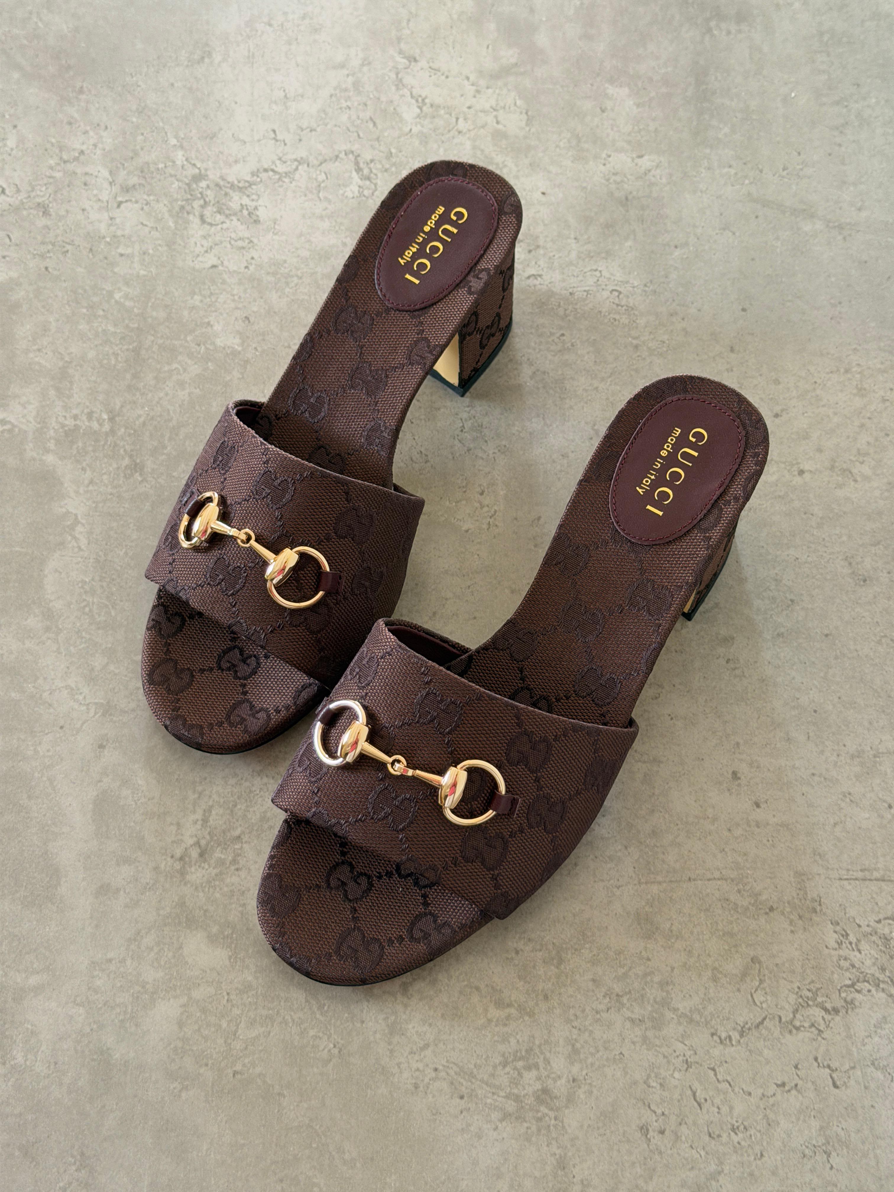 Gucci Horsebit slide sandals in GG canvas