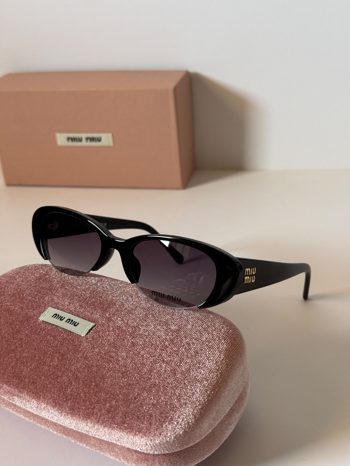 Miu Miu Vedette Oval Sunglasses