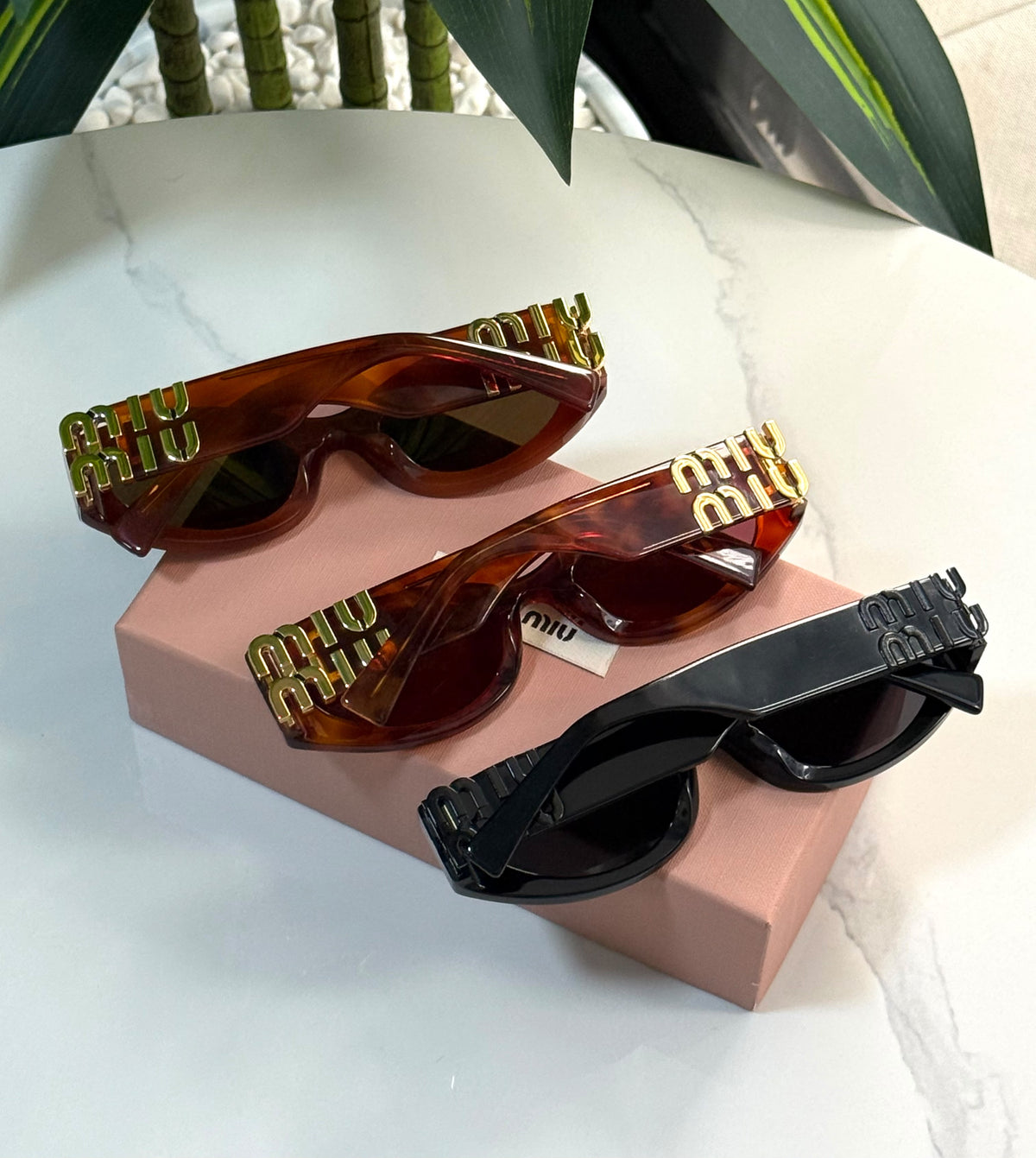 Miu Miu Glimpse Oval Sunglasses