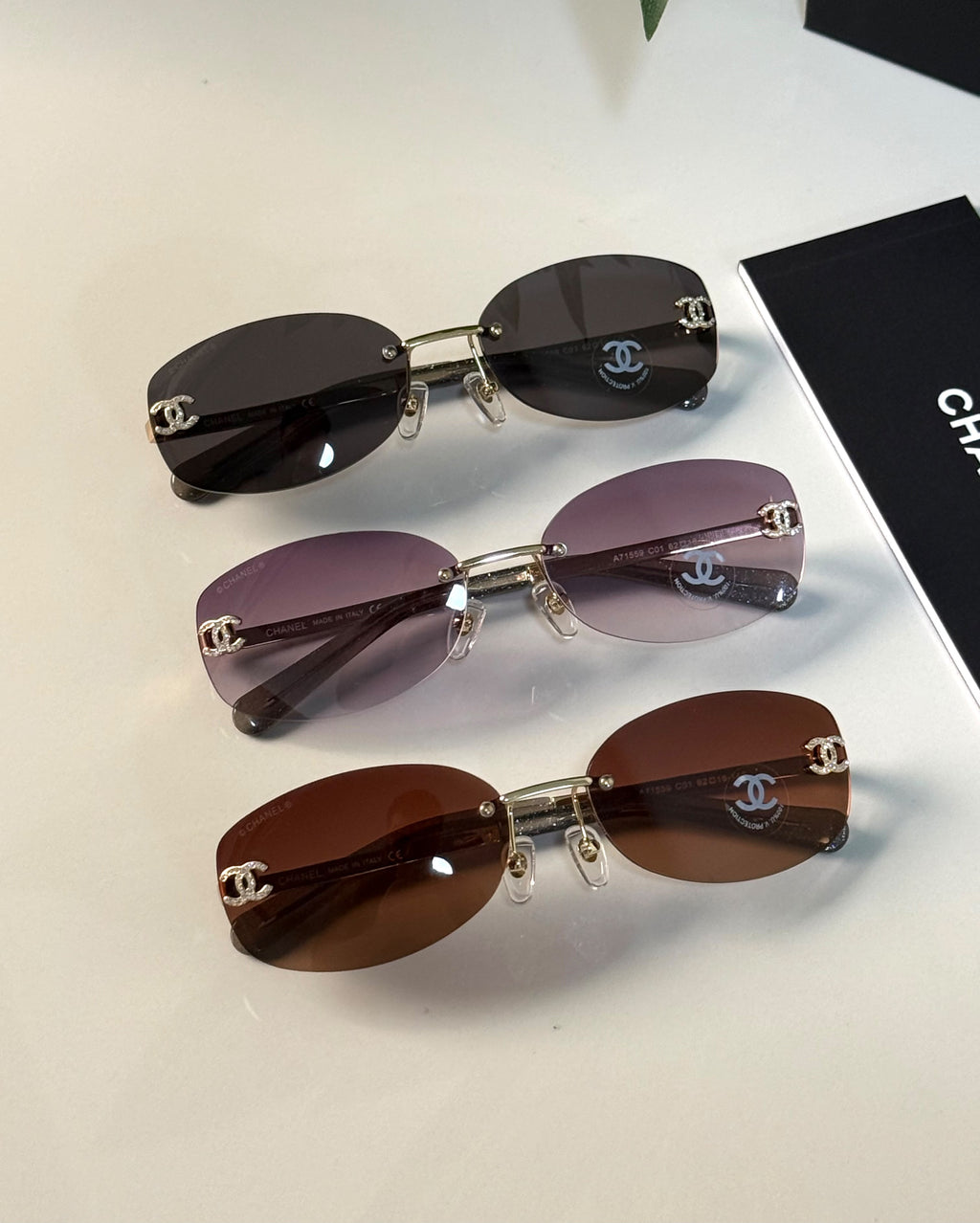 Chanel Rimless Crystal CC Oval Sunglasses