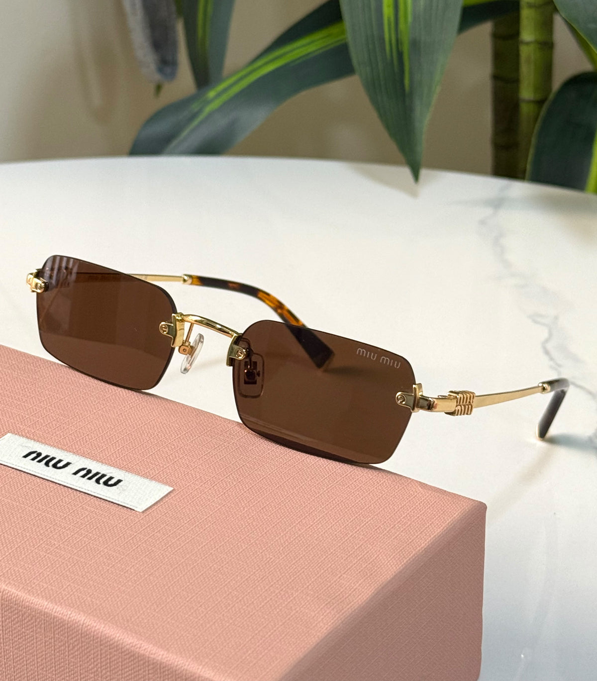 Miu Miu Vertical Logo Rimless Rectangle Sunglasses
