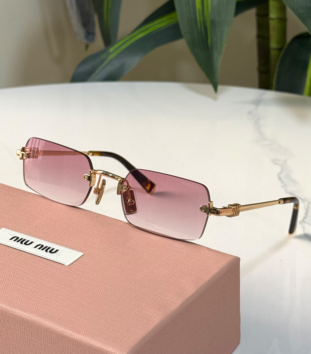 Miu Miu Vertical Logo Rimless Rectangle Sunglasses