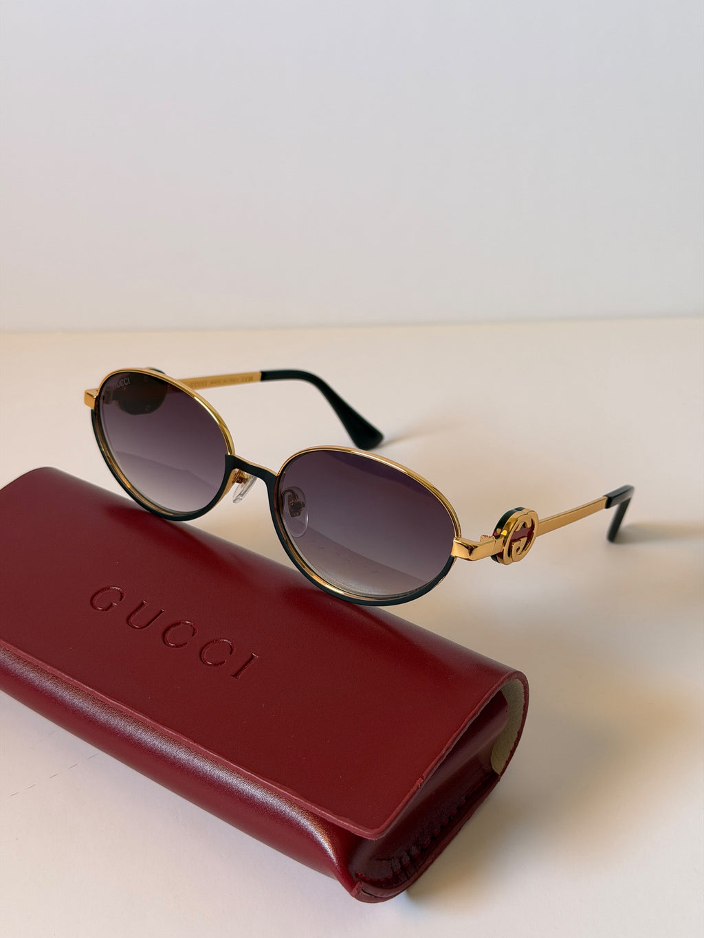 Gucci GG Cut-Out Oval Sunglasses