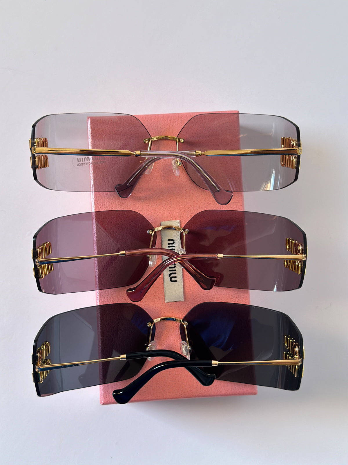 Miu Miu MU 54YS Runway Rimless Wide Irregular Sunglasses
