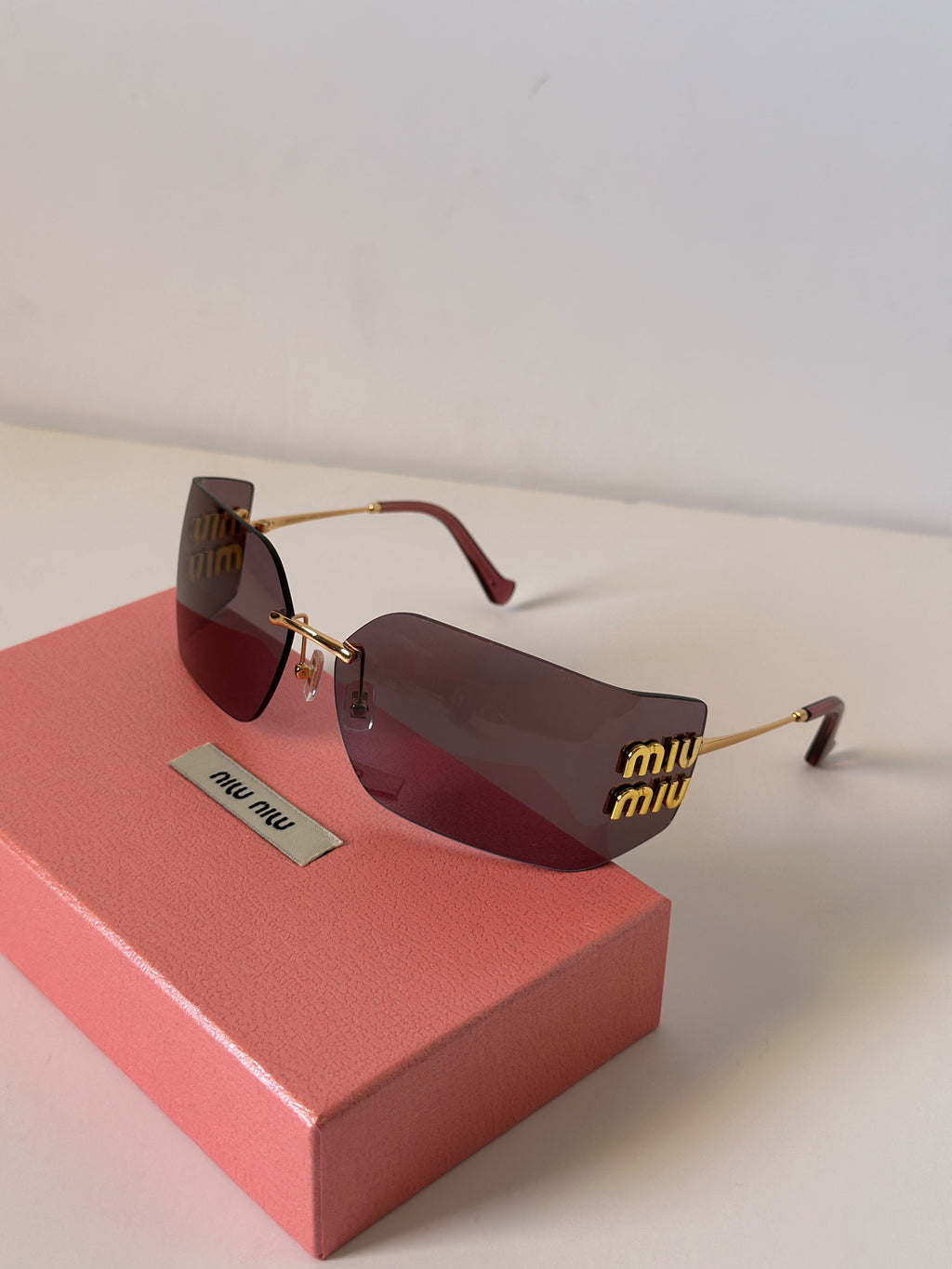 Miu Miu MU 54YS Runway Rimless Wide Irregular Sunglasses