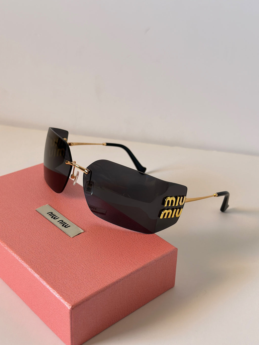 Miu Miu MU 54YS Runway Rimless Wide Irregular Sunglasses