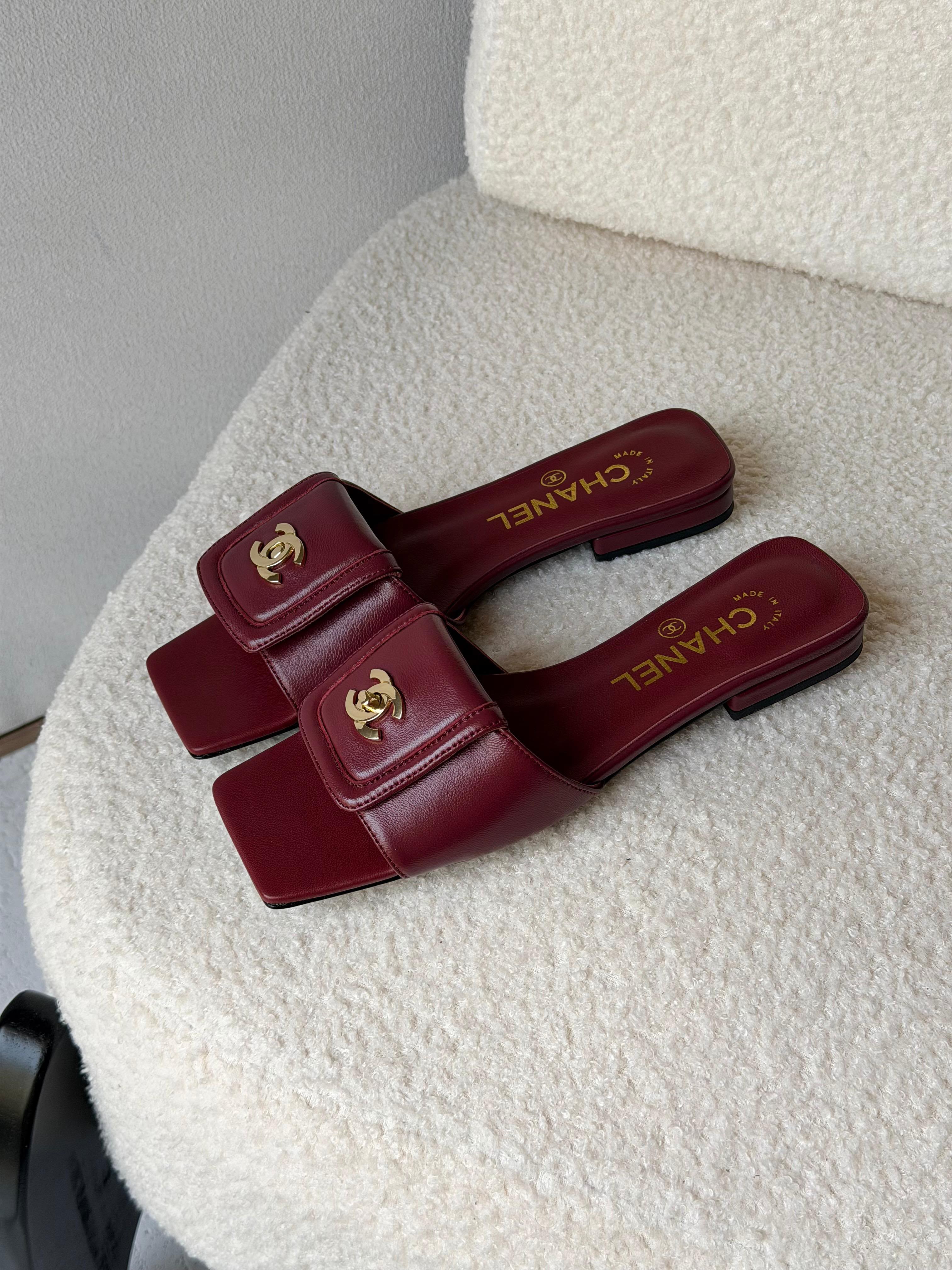 Chanel Turn-Lock Flat Slides
