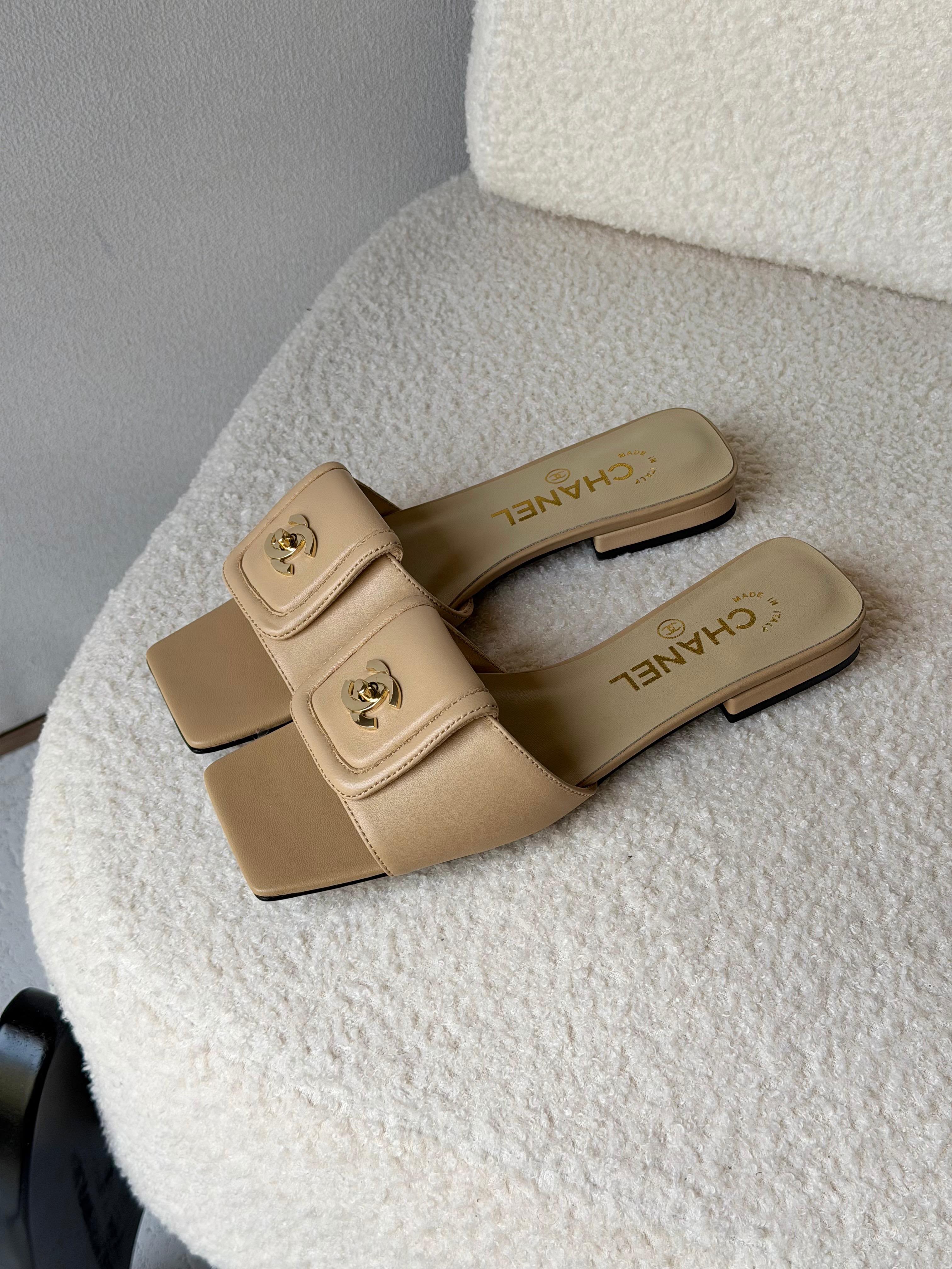 Chanel Turn-Lock Flat Slides