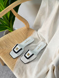 Chanel Turn-Lock Flat Mules