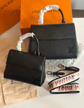 Louis Vuitton Cluny Handbag