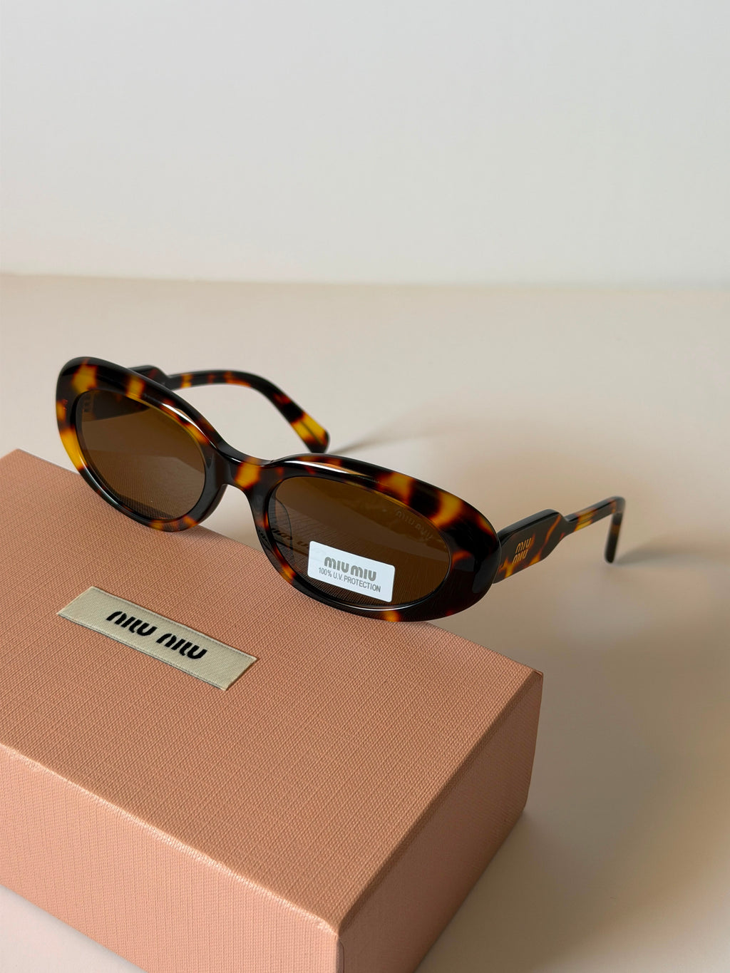 Miu Miu B09S Oval Sunglasses