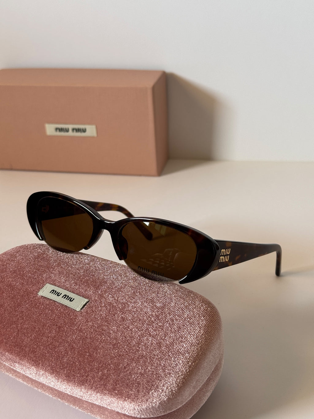 Miu Miu Vedette Oval Sunglasses