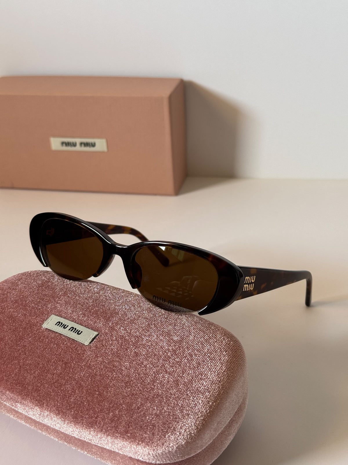 Miu Miu Vedette Oval Sunglasses