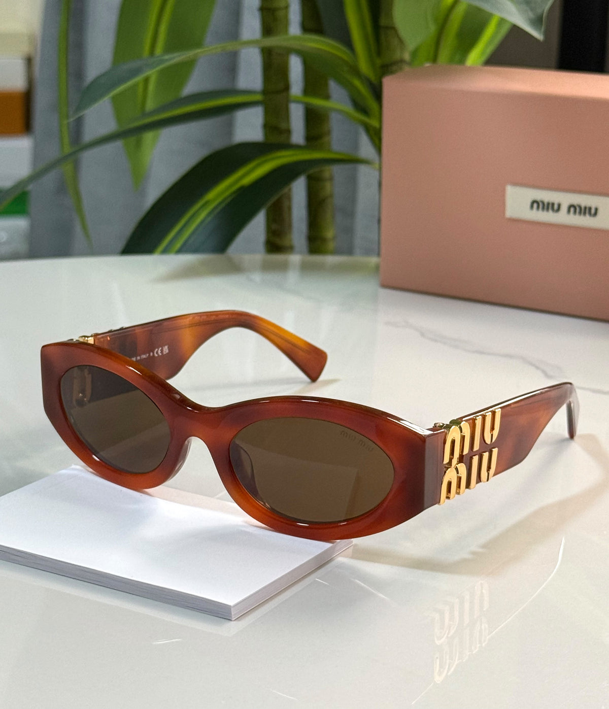 Miu Miu Glimpse Oval Sunglasses