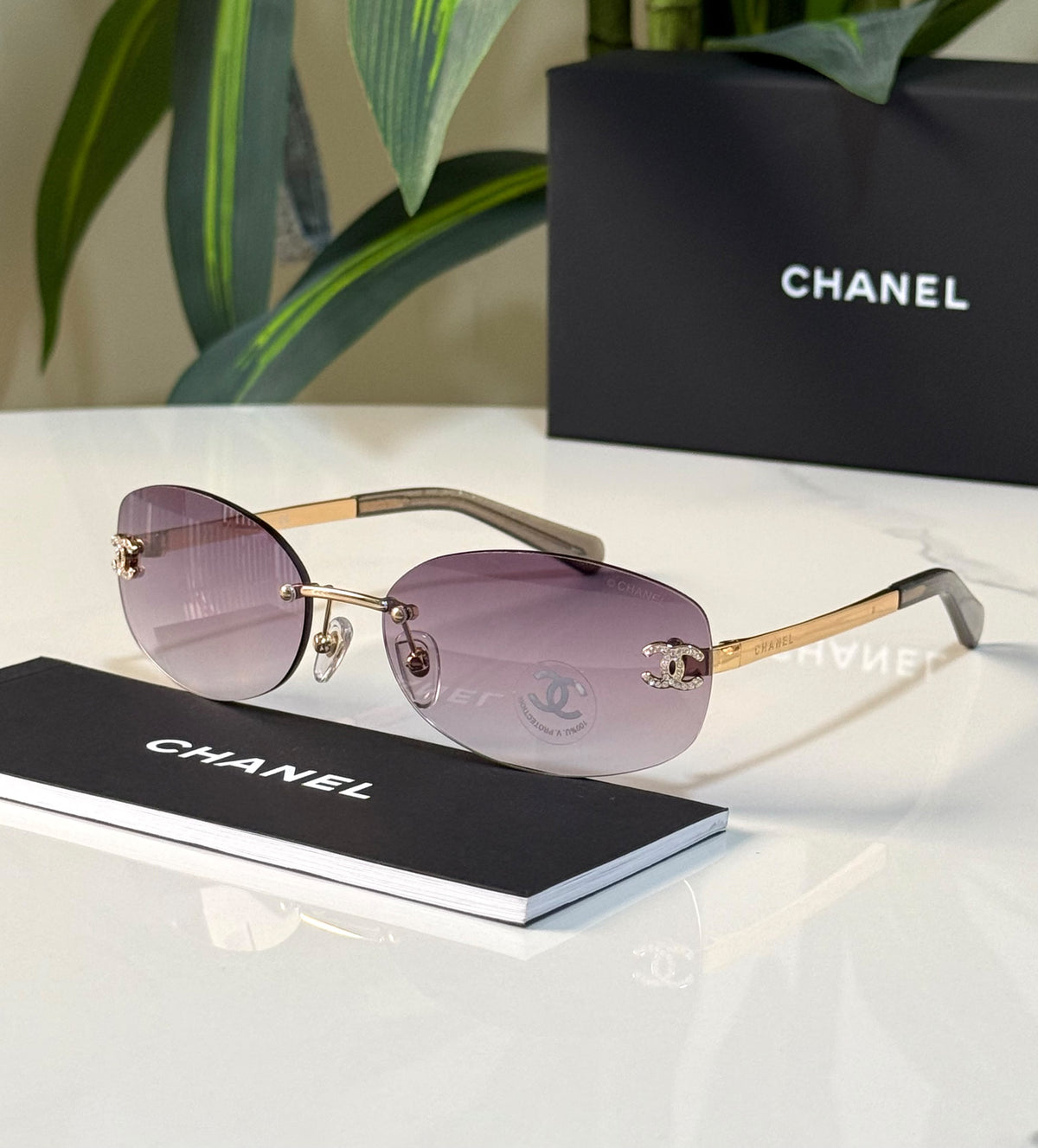 Chanel Rimless Crystal CC Oval Sunglasses