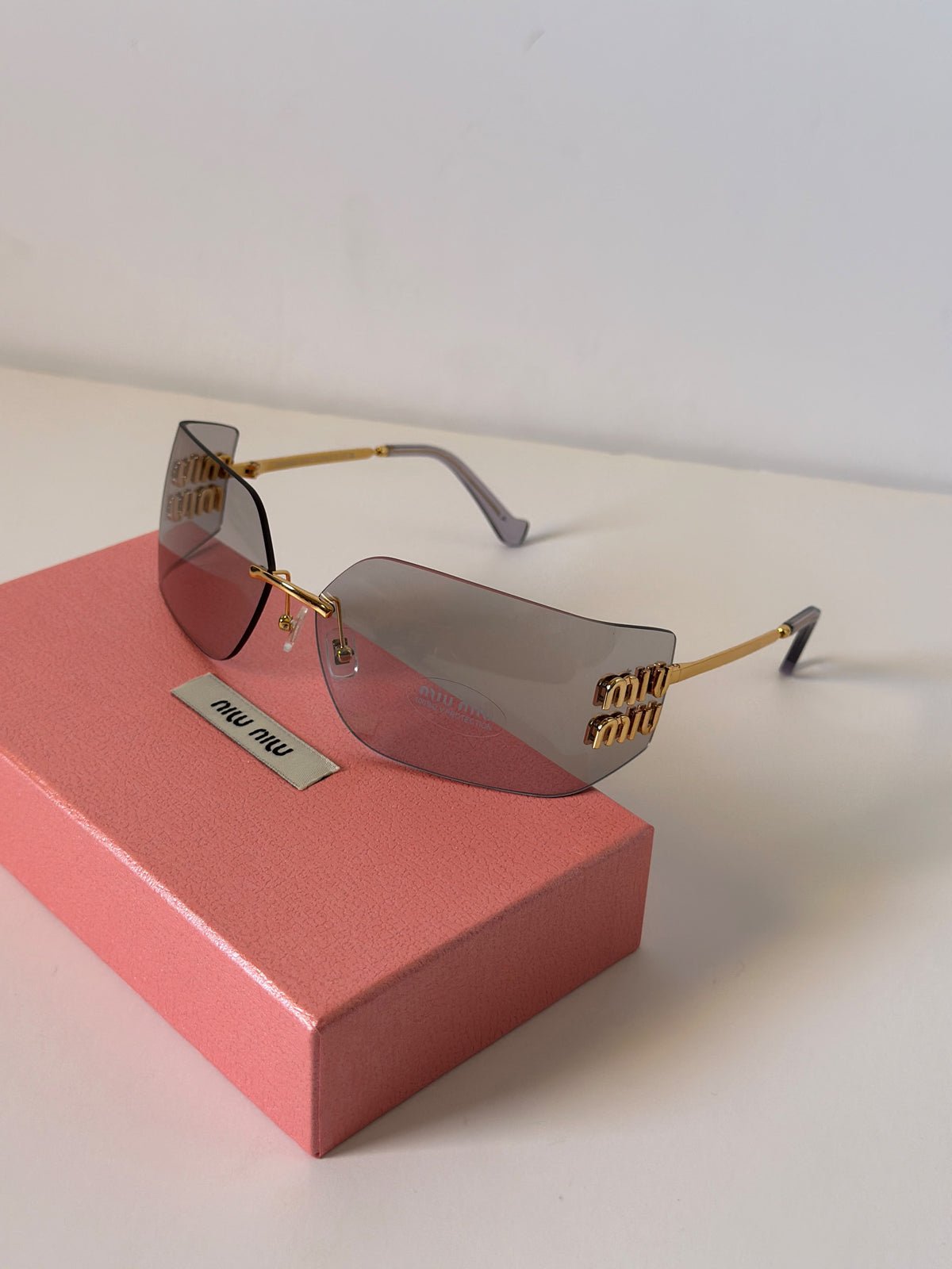 Miu Miu MU 54YS Runway Rimless Wide Irregular Sunglasses